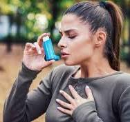 Asthma-A girl using inhaler